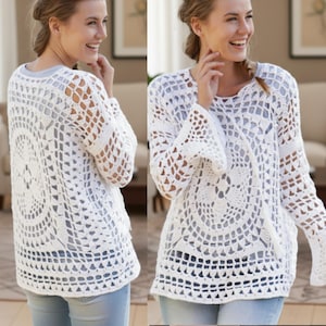 May include: White crochet sweater with a round yoke design and bell sleeves. The open weave pattern creates a delicate, airy look. The sweater is a light, neutral color, suitable for layering. The neckline is a simple crew neck.