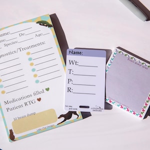 May include: A collection of stationery items, including notepads and forms, with a pet theme. The forms have fields for patient information and treatments. The notepads feature decorative borders with dog illustrations and the text "brain dump area".
