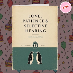 May include: A rectangular greeting card with a cream-colored top section and a dark teal bottom section. The text reads LOVE, PATIENCE & SELECTIVE HEARING, Anniversary Edition. A small oval logo features two penguins, and two penguins stand below.