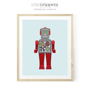 Könnte beinhalten: Eine Illustration eines Vintage-Roboters mit rotem Körper, silbernem Kopf und grünen Augen. Der Roboter hat eine Reihe von bunten Zahnrädern, die in seiner Brust sichtbar sind.