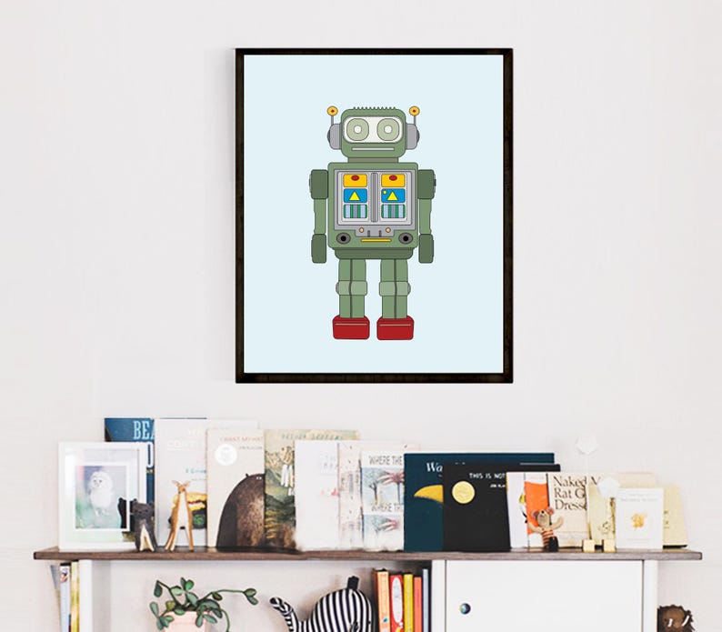 K&ouml;nnte beinhalten: Eine gerahmte Illustration eines gr&uuml;nen Roboters mit roten Schuhen und gelben und blauen Details. Der Roboter hat Antennen und einen rechteckigen K&ouml;rper mit einem Gesicht.