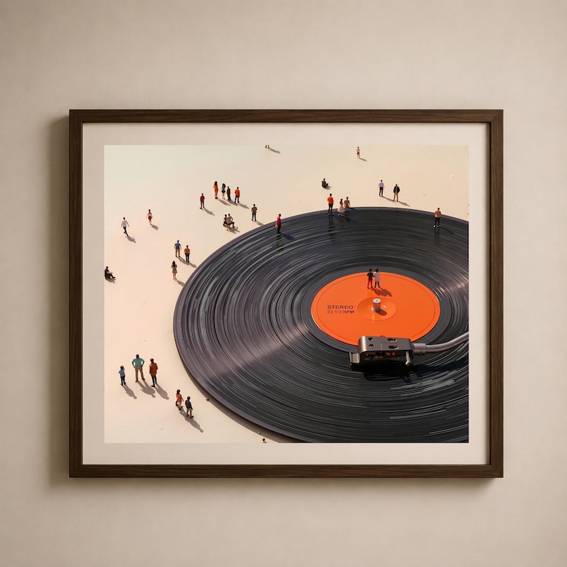 May include: Framed art print featuring a large vinyl record with an orange center label. Miniature figures are scattered around the record, creating a surreal scene. The record player needle is in place, and the frame is a dark brown.