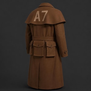 May include: A brown trench coat featuring a capelet back with the text A7 printed in a light tan color. The coat includes a belted waist, two large front pockets with button closures, and long sleeves with buttoned cuffs on a solid dark background.