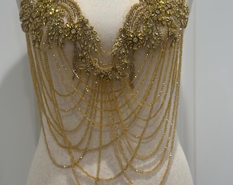 Guldfärgad applikation med strass/ 07