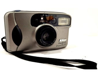 Cámara Nikon One Touch Zoom 70 AF de segunda mano, 35 mm, compacta y funcional. No se admiten devoluciones.