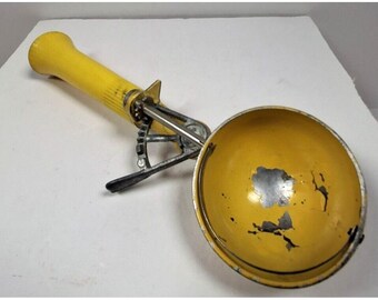 Vintage gele Nevco mechanische ijsschep