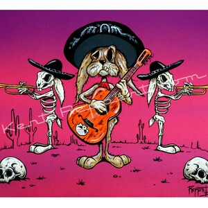 May include: A whimsical illustration depicts a rabbit mariachi band. The rabbit plays a guitar, flanked by skeleton rabbits playing trumpets. The artwork features a vibrant pink and purple desert backdrop with cacti and skulls.