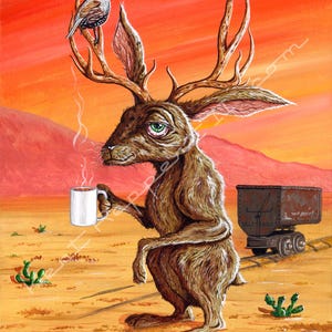 May include: An artistic painting depicts a jackalope with deer antlers, holding a steaming white mug in a desert landscape. A small bird perches on its antlers. A rusty mine cart sits on tracks in the background. The sky is a gradient of orange and red.