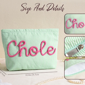 May include: A mint green and white striped cosmetic bag with the name "Chole" embroidered in pink. The bag is 10.4 inches long, 6.6 inches high, and 2.5 inches wide. It has a zipper closure.