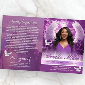 Peut inclure: Un programme de service commémoratif avec un design violet et blanc. Le programme comprend le texte "Remerciements" et "Arrangement". Le côté droit présente une photo d'Amelia Miller, avec les dates du 15 novembre 1969 au 20 avril 2024.