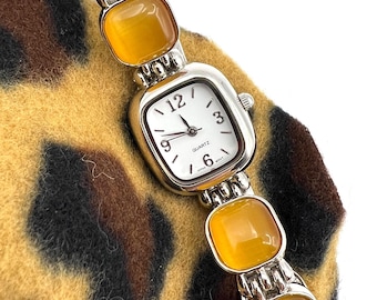 Avon Quartz Dress Wrist Watch with Golden "Cats Eye" Gemstones