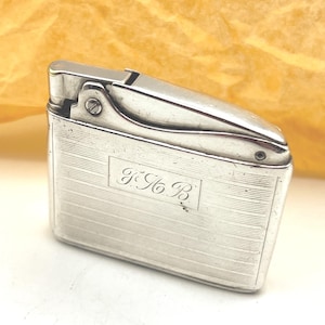 Antique Sterling Silver Lighters
