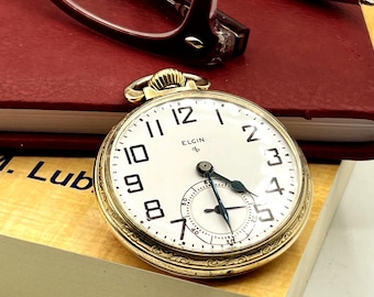 Reloj de bolsillo Elgin antiguo chapado en oro de 10 quilates, 17 rubíes, tamaño 16, esfera abierta.