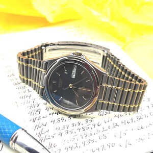 Seiko Sq 100 - Etsy