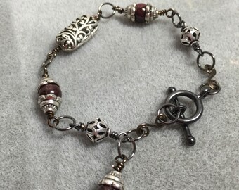 Wire wrapped Garnet bracet with silver tone beads