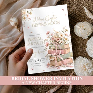 May include: A white bridal shower invitation card featuring the text A New Chapter BEGINS SOON and BRIDAL SHOWER. The design includes a stack of four vintage-style books in muted tones tied with a pink ribbon, topped with delicate wildflowers.
