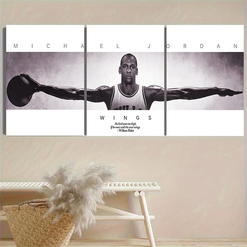 May include: Black and white triptych wall art featuring Michael Jordan with the text "WINGS" and a quote by William Blake. The artwork shows Jordan with his arms outstretched, holding a basketball.