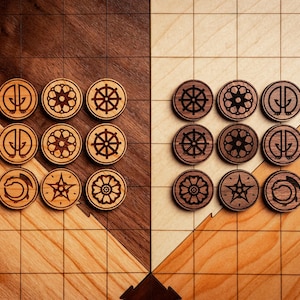 May include: Wooden game pieces with various engraved symbols, including anchors, wheels, and floral designs, are arranged on a two-toned wooden game board. The pieces are brown and tan, and the board has a grid pattern.