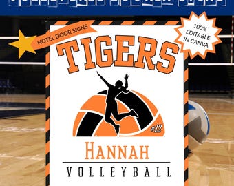 May include: A volleyball locker sign with the word "TIGERS" in orange block letters. The sign features a silhouette of a volleyball player jumping, a volleyball, and the name "HANNAH". The sign also says "VOLLEYBALL".