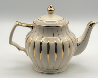 Tetera vintage Sadler color crema con rayas doradas, de porcelana inglesa, estilo Art Déco, pieza de colección.
