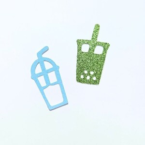 May include: Confetti cutouts of a blue icee and a green boba tea drink. The text "ICEE & BOBA" is at the top of the image.