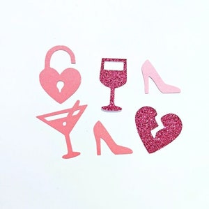 May include: Pink and glitter confetti with images of a broken heart, a wine glass, a martini glass, a high heel shoe, and a heart-shaped padlock with the keyhole open. The text "CONFETTI DIVORCE PARTY" is at the top of the image.