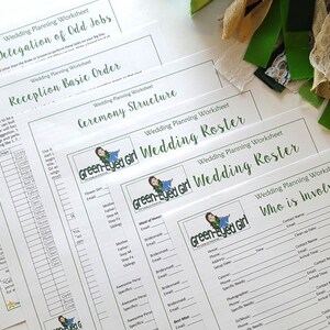 May include: A collection of wedding planning worksheets with headings like "Delegation of Odd Jobs" and "Wedding Roster." The worksheets are printed on white paper with green accents and the "Green-Eyed Girl" logo. Decorative ribbons and a macaron are also visible.