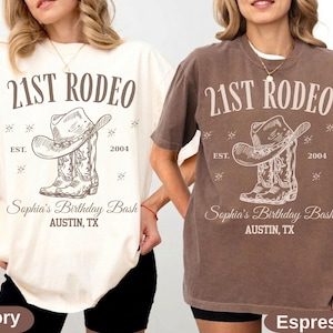 May include: Ivory and espresso-colored t-shirts with a rodeo-themed graphic. The design includes a cowboy hat and boots, the text "21st Rodeo", "Sophia's Birthday Bash", and "Austin, TX".