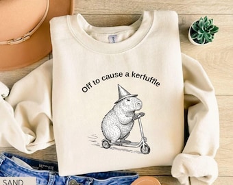 Off To Cause A Kerfuffle Sweatshirt, Funny Capybara Scooter Graphic, Silly Animal Humor, Adult Humor Sarcastic Crewneck