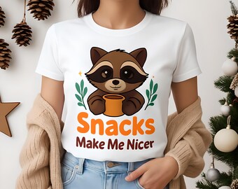 Adorable Cartoon Raccoon Holding Mug with Snacks Sticker