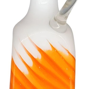 Vintage glass jug in orange and white with clear handle