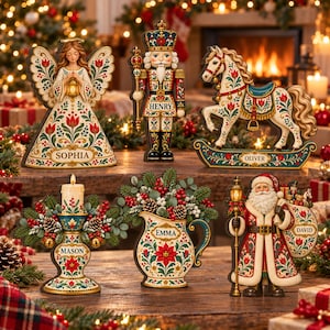 May include: A collection of six decorative Christmas ornaments featuring an angel labeled Sophia, a nutcracker labeled Henry, a rocking horse labeled Oliver, a candle holder labeled Mason, a pitcher labeled Emma, and Santa Claus labeled David.