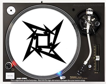 May include: Black and white turntable slipmat with a stylized starburst design. The slipmat is on a black turntable with a silver tone tonearm.