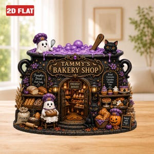 May include: A decorative cauldron-shaped bakery display featuring the text TAMMY'S BAKERY SHOP. The scene includes two white ghost figures in purple chef hats, a black cat, shelves of baked goods, a flour sack, and a pumpkin, all set in a dark, detailed structure with purple bubbling liquid on top.