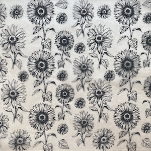 Peut inclure: Un motif sans couture de tournesols stylisés en noir et blanc sur un fond crème. Les tournesols sont dessinés dans un style graphique simple, en mettant l'accent sur les pétales et le centre.