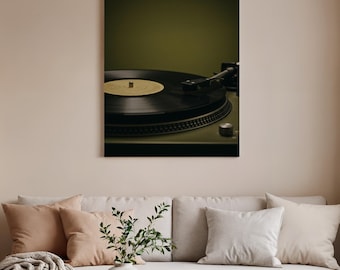 May include: A close-up of a vintage record player with a black vinyl record. The turntable is green with silver accents. The record label is yellow. The background is a muted green. The image is a vertical shot.