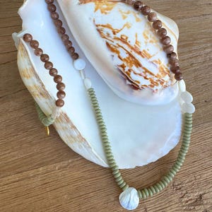 Earthy natural brown stone and green bead necklace, natural shell charms