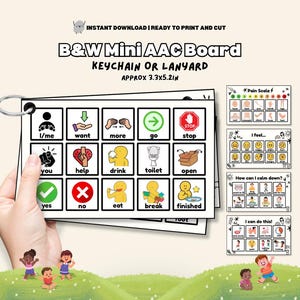 May include: A black and white mini AAC board, approximately 3.3 x 5.2 inches, held by a hand. The board includes icons for communication, such as "I/me," "want," "go," and "stop." Additional pages show pain scales and emotional states. The text "B&W Mini AAC Board" is visible.