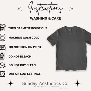 May include: A dark gray t-shirt displayed next to washing and care instructions. The text reads: Instructions, Washing & Care, Turn garment inside out, Machine wash cold, Do not iron on print, Do not bleach, Do not dry clean, Dry on low settings, Sunday Aesthetics Co.