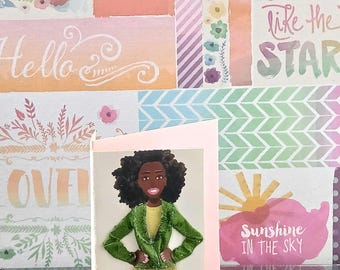 May include: A greeting card featuring a three-dimensional illustration of a person with dark curly hair, wearing a green textured jacket, a yellow top, a yellow pleated skirt, and light-colored shoes, with the handwritten name Willie Mitchell.