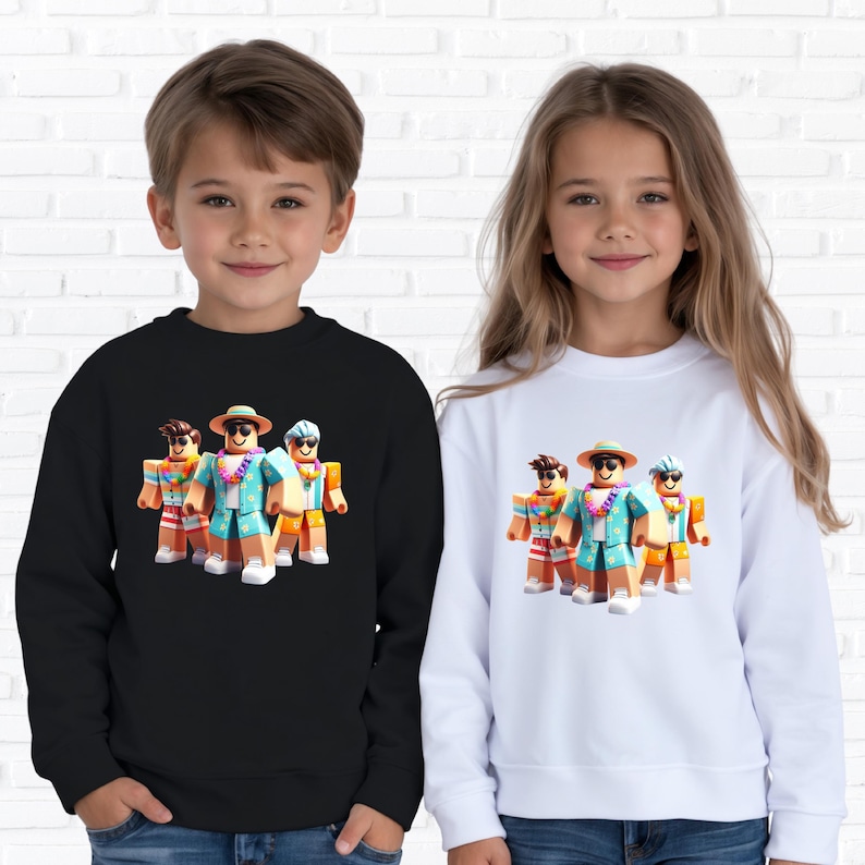 Puede incluir: Sudaderas negras y blancas con un gr&aacute;fico colorido de tres figuras en bloques con atuendo tropical. Las figuras llevan gafas de sol, sombreros y leis. Las sudaderas las llevan ni&ntilde;os.