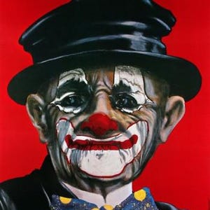 May include: A clown portrait with white face paint, a red nose, and a red and white smile. The clown is wearing a black hat, a black suit, and a blue bow tie with yellow polka dots against a red background.