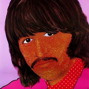 May include: A pop art portrait of Ringo Starr. The image shows a close-up of the musician's face with brown hair, a mustache, and a pink shirt with a red polka dot pattern. The text "RINGO STARR" is at the bottom.