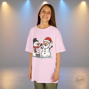 Funny Snowman Building Santa Shirt, Kids Christmas Role Reversal Tee, Cute Twisted Holiday Clothing, Whimsical Winter Fun Youth Top