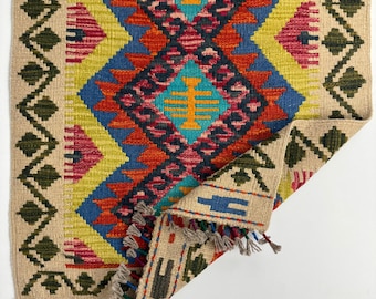 Handwoven Wool Kilim Rug: Small Turkish Tribal Design