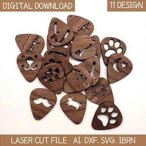 Könnte beinhalten: Eine Sammlung von lasergeschnittenen Gitarrenplektren aus Holz in dunklem Braun, mit verschiedenen Designs wie Hundegesicht, Herzen und Schnurrbart. Der Text "DIGITAL DOWNLOAD" und "11 DESIGN" ist ebenfalls enthalten.