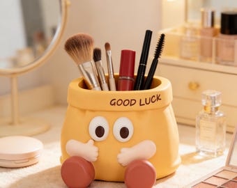 Uroczy organizer na długopisy w kształcie woreczka „Powodzenia” – organizer biurkowy z żywicy, zabawny gadżet biurowy, idealny do dekoracji artykułów biurowych i szkolnych