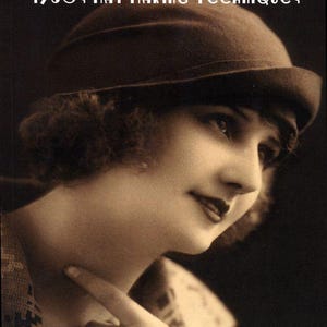 May include: A book cover titled Millinery 1930s Hat Making Techniques featuring a sepia-toned photograph of a person wearing a dark, rounded felt hat with a small brim, positioned in profile against a dark background with white text.