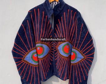 May include: Navy blue jacket with a high collar and a zipper closure. The jacket features embroidered eye designs with red, blue, and green accents. The text "Farhanhandicraft" is visible on the jacket.