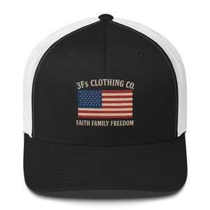 May include: Black and white trucker hat with the text "3Fs Clothing Co." and an embroidered American flag design. The text "Faith Family Freedom" is below the flag.